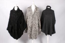 Three pieces of designer knitwear.