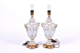 Pair of Capodimonte Tiche large gilt porcelain table lamps.