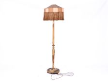 Circa 1920's chinoiserie standard lamp and shade. Raised on a circular base.