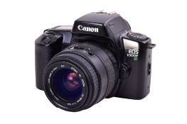 A Canon EOS 1000F N 35mm SLR camera. With a Sigma DL Zoom 35-80mm f4-5.6 lens, optics G.