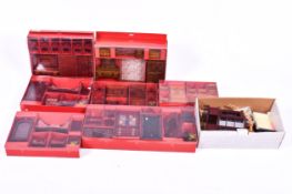 A quantity of vintage dolls house furniture, boxed.