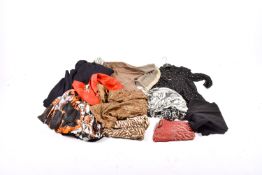 An assortment of ladies' vintage, designer and high street clothing.