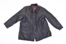 A gents barbour wax jacket, approximate size L. Button and zip front pockets (working).