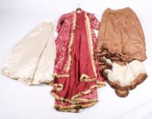 An assortment of 19th century and later clothing.