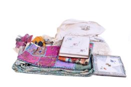 Quantity of assorted vintage textiles, fans and hand bags.