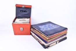 A collection of assorted 1970s and 80s vinyl LP records and 7