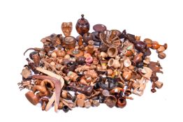 An extremely large collection of assorted treen. Including hand turned vases, carved animals, etc.