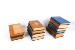A collection of assorted antiquarian books with some prize bindings.