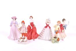 A group of six assorted porcelain figures.
