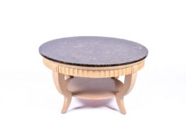 A French circa 1950s circular marble top coffee table.