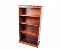 A 20th Century mahogany bookcase with adjustable shelves.