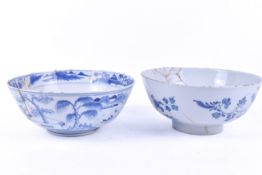Two 18th century blue and white decorated bowls (A/F).