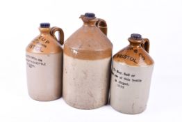 Three 'Bristol Pickup' honey glazed earthenware flagons with at least two of them have matching