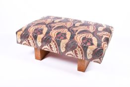 A large ottoman style reception seat stool of rectangular form. Having iLiv Eames style upholstery.