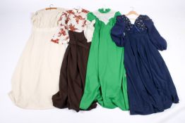 Four vintage 1970s and 1980s dresses.