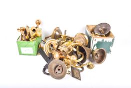A collection of assorted brass door fittings and door furniture.