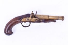 18th Century flintlock pistol having wire inlaid walnut stock (af).