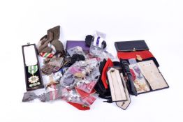 A quantity of facsimile medals and assorted military woven badges and epaulettes