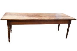 A large 19th Century oak farmhouse dining table.