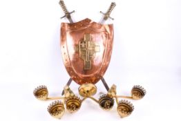 Three modern brass wall lights and a copper 'Lombard' shield.