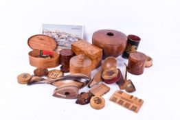 A collection of assorted treen items including boxes, doorstop and a burr redwood urn by Phil Irons.