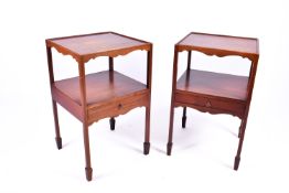 A pair of 20th century Georgian style mahogany nightstands.