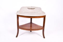 An antique marble top corner washstand.