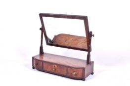 19th Century mahogany box base dressing table mirror. Having three drawers, raised on ball feet.