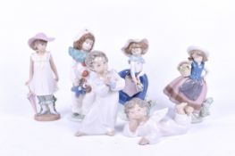 A collection of assorted Spanish porcelain figures. Including Lladro and Nao.
