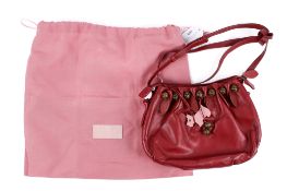 A red fringed Radley handbag with pink dustbag. Working zipm lined interior with dot fabric.