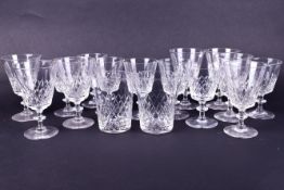 Collection of assorted drinking glasses. Including two tumblers and two sets of seven wine glasses.