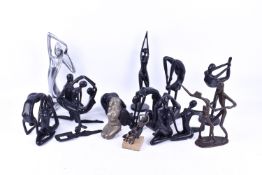 A collection of various resin figures mostly modelled as female dancers or acrobats.