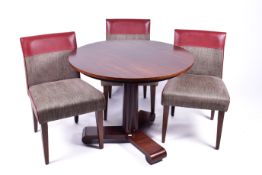 A modern circular mahogany single pedestal table and three upholstered chair. Diameter 91cm.