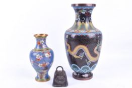 Two brass Chinese cloisonne vases and a small reindeer bell.