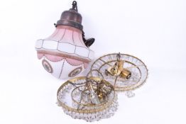 An early 20th Century ceiling lamp with decorative glass shade.