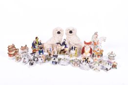 Quantity of Staffordshire pottery including comforter spaniels,