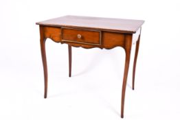 A 20th century French style writing or side table with single drawer. Raised on cabriole supports.