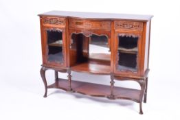 Late Victorian mahogany chiffonier base fitted with two glass doors.