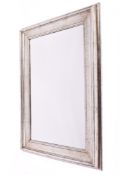 A modern French style silver wall mirror.