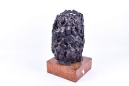 Composite bust of a lady, on an oak plinth.