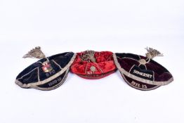 A group of three assorted early 20th century sporting caps.