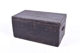 A small late 19th early 20th century stud work travel trunk.