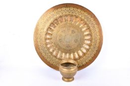 Two Anglo-Indian brassware items. Including a large charger and a bowl.