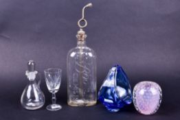 A group of five assorted glass items. Including a Boots Chemist bottle, a whisky noggin, etc.
