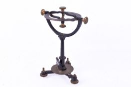 A vintage Philip and Harris dip circle inclinometer.H25cm x W16.