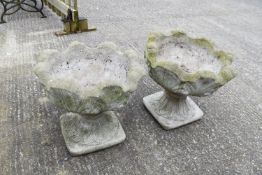 A pair or reconstituted stone pots.