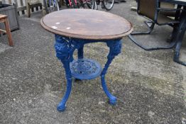A 20th Century blue cast metal garden pub table with wooden plank top H70cm x 60cm diameter