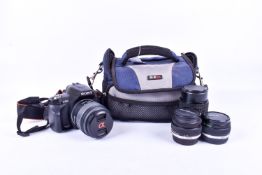 A collection of assorted cameras in a GEM bag.