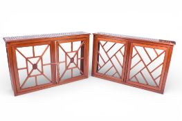 Two similar 20th century Georgian style mahogany radiator covers.