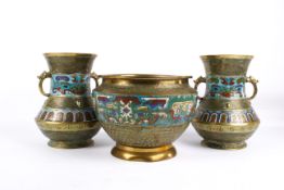 Pair of Chinese brass and cloisonne urns with a similar jardinere. Largest H23cm. (3).